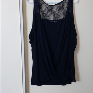 Black draped open front blouse.